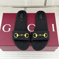 SLIDE SANDALS IN BLACK FABRIC EMBOSSED LOGO
