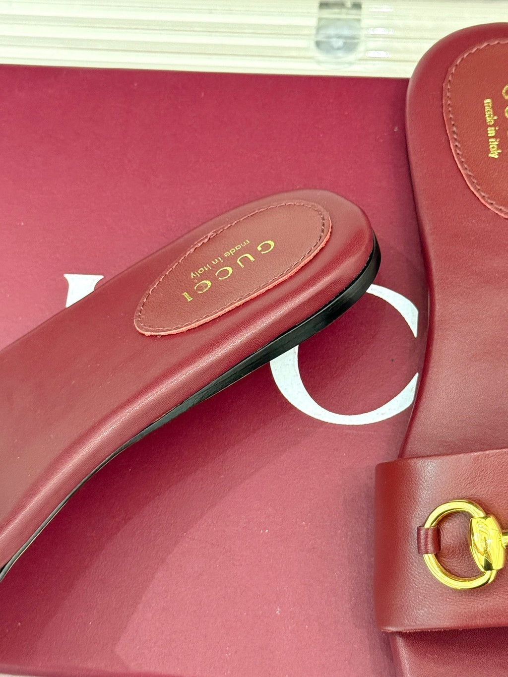 SLIDE SANDALS IN RED CALFSKIN WITH GOLD HARDWARE